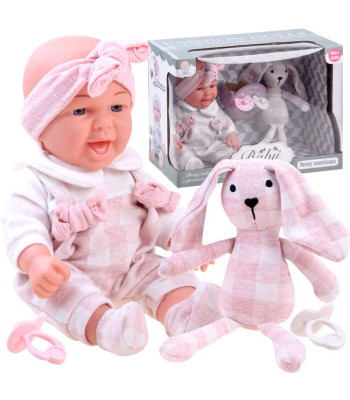 Mielas kūdikis su pliušiniu triušiuku