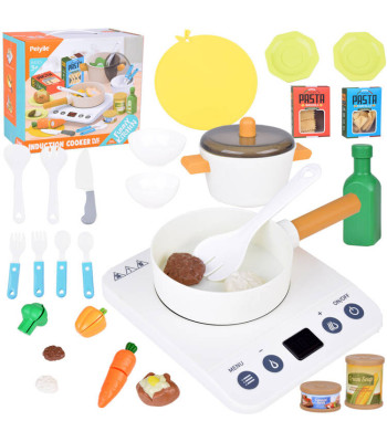 Indukcinė viryklė su virtuvės indais ir daržovėmis