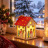 Medinis kalėdinis namelis-lampionas su LED apšvietimu, sniego senio motyvas, 9 cm