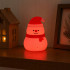 Silikoninė LED kalėdinė sniego senio lempa su USB įkrovimu ir 3 švietimo režimais, 9 × 6 cm